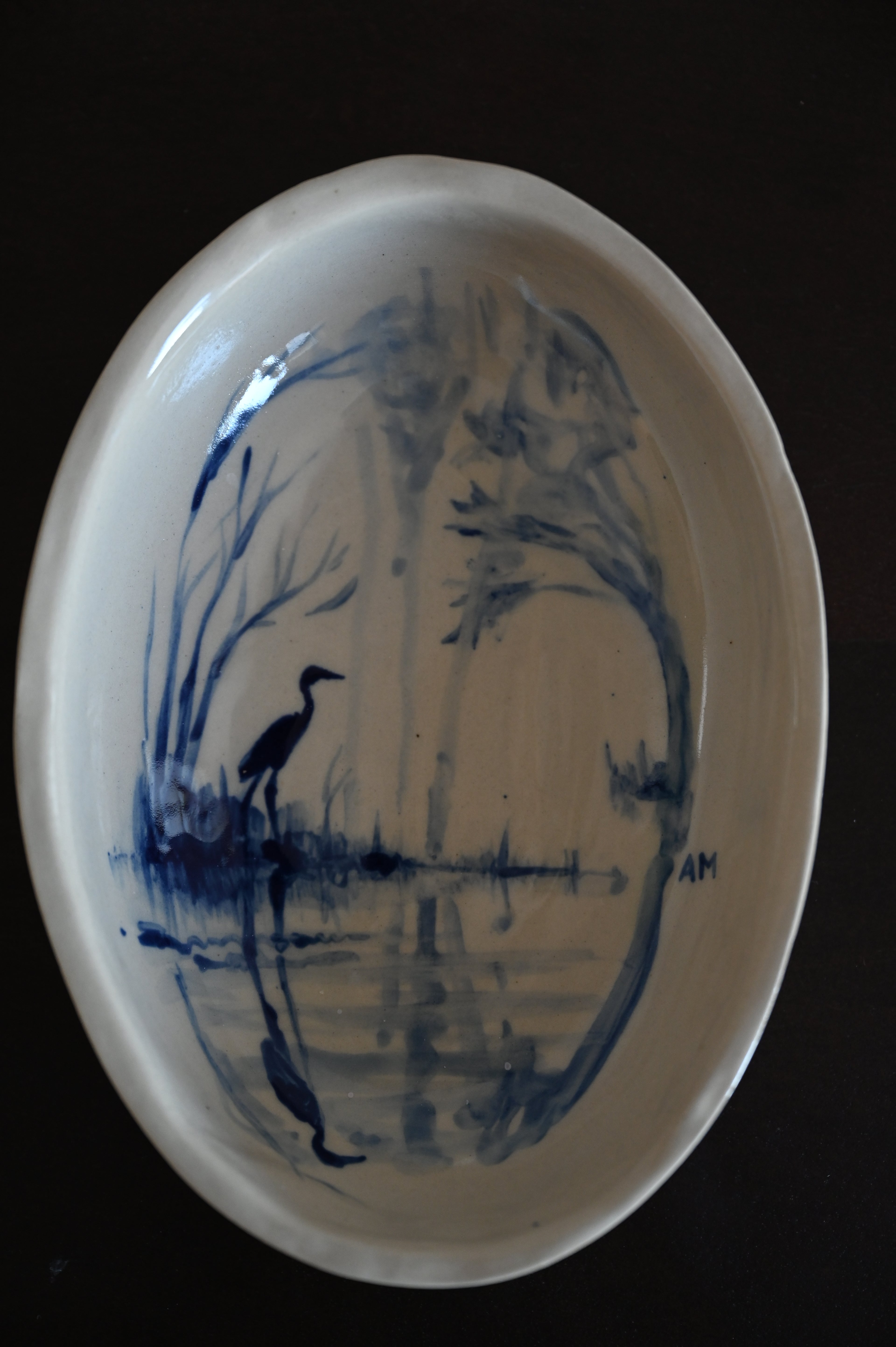 Ovale schaal met reiger