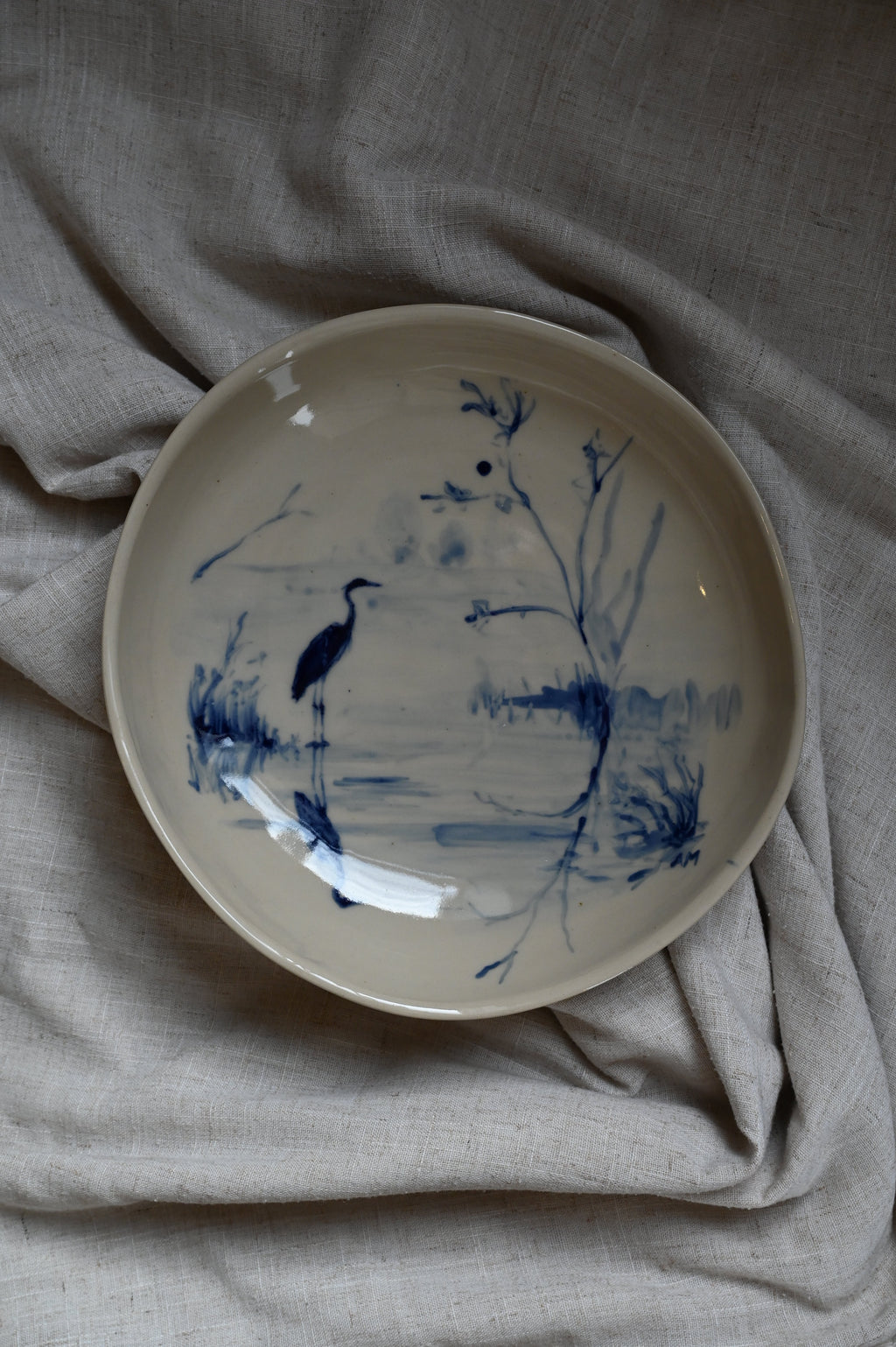 Ronde schaal met reiger