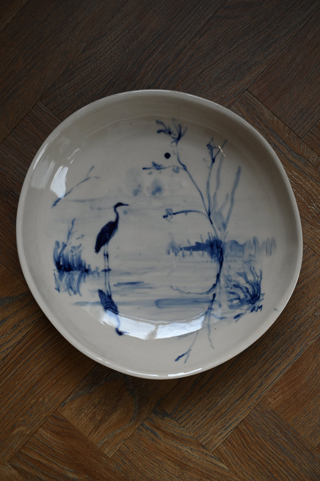 Ronde schaal met reiger