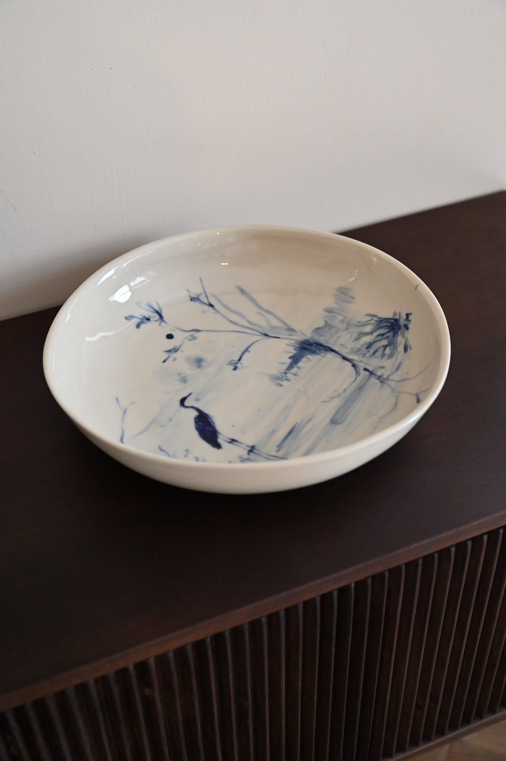 Ronde schaal met reiger