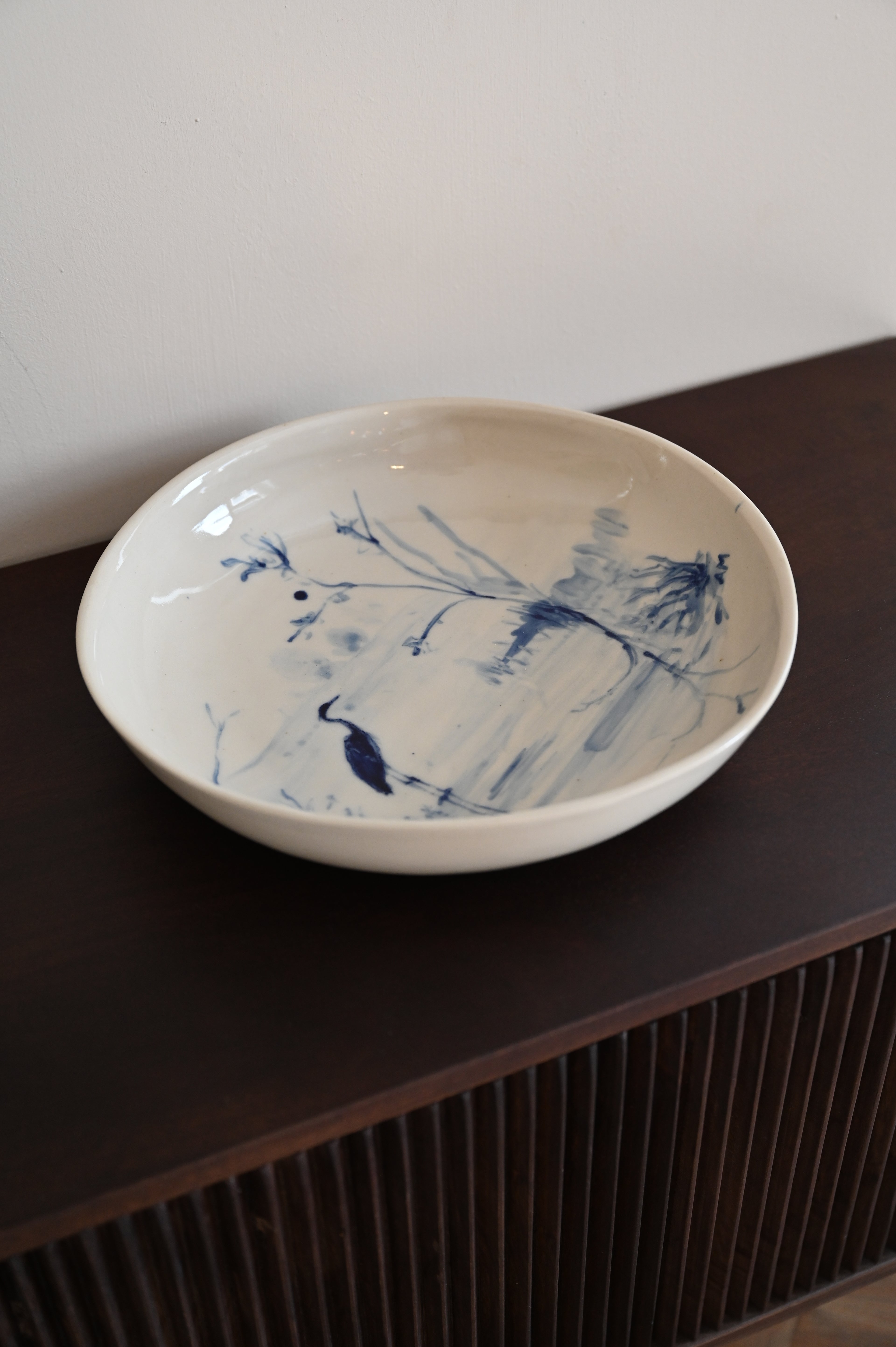 Ronde schaal met reiger